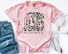 Jesus Coquette graphic tee by Anchored Grace Boutique, featuring a stylish design on a comfortable casual t-shirt.