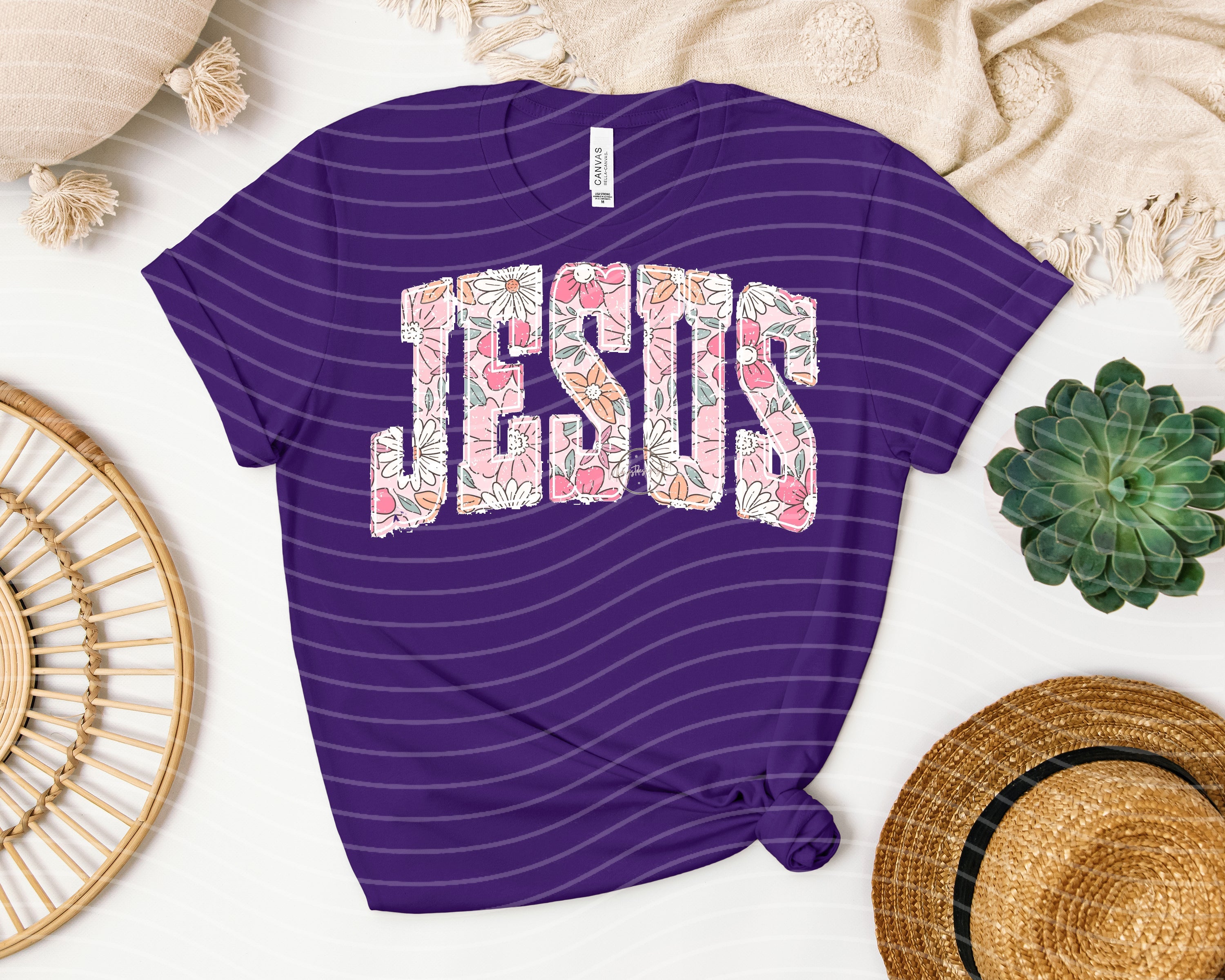 Jesus floral graphic tee from Anchored Grace Boutique featuring a vibrant floral Jesus design on soft cotton fabric.