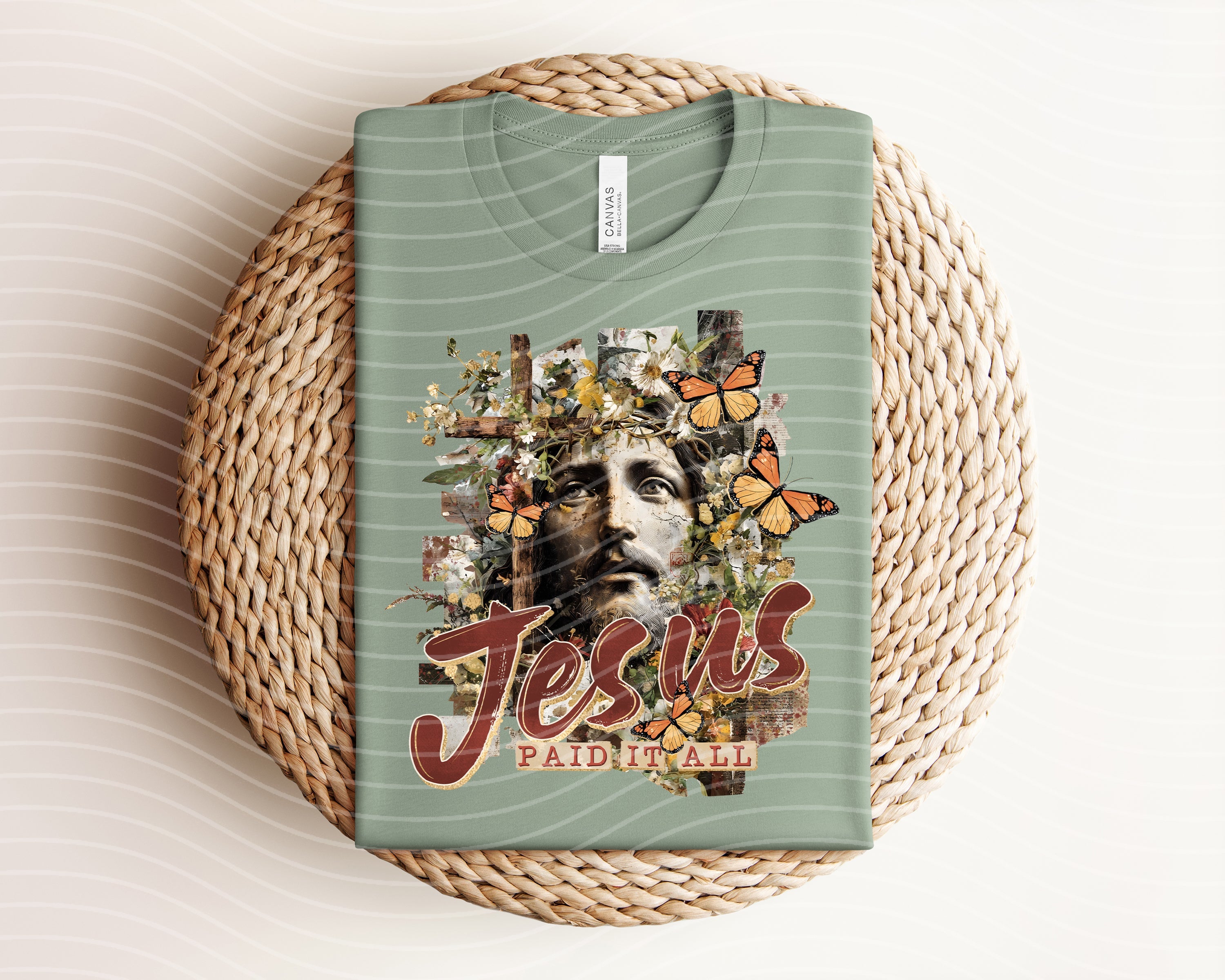 Jesus Paid It All graphic tee from Anchored Grace Boutique, featuring Christian religious text and a casual t-shirt design.