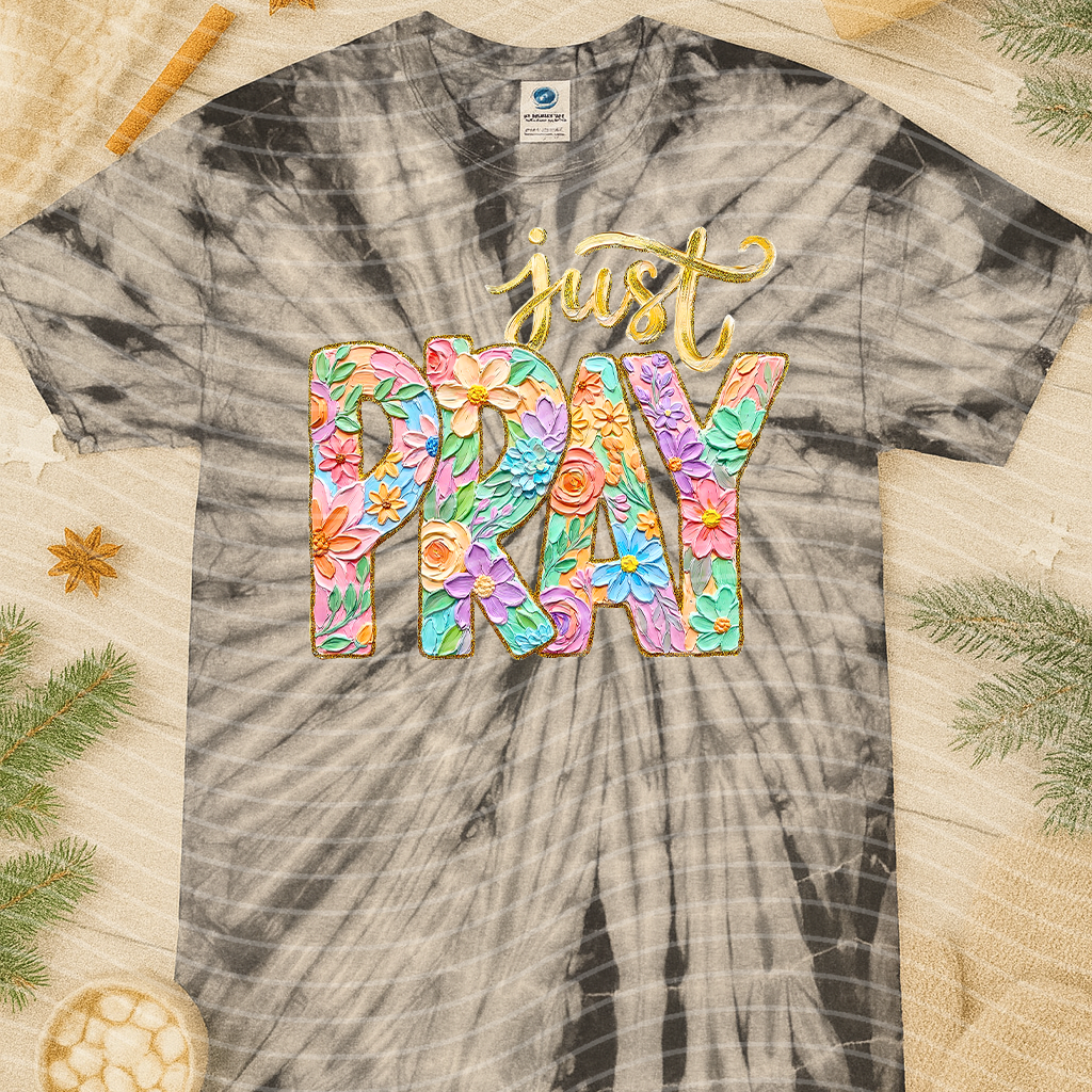 Black Just Pray graphic tee by Anchored Grace Boutique featuring prayer-themed text and casual crew neck design.