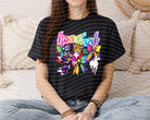 Anchored Grace Boutique Lisa Frank graphic tee featuring colorful Lisa Frank design on a casual cotton t-shirt for women.