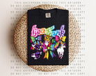 Anchored Grace Boutique Lisa Frank graphic tee featuring colorful Lisa Frank design on a casual cotton t-shirt.