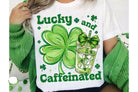 Anchored Grace Boutique Lucky and Caffeinated graphic tee, casual men's T-shirt with playful text and coffee-themed design.