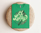 Lucky graphic tee by Anchored Grace Boutique featuring a colorful, stylish design on a casual cotton t-shirt.