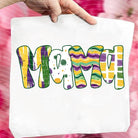 Mama Mardi Gras graphic tee from Anchored Grace Boutique featuring festive Mardi Gras design and bold lettering on soft fabric.