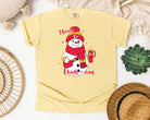 Anchored Grace Boutique Merry Chiefs-mas graphic tee featuring festive holiday design and bold lettering on a casual T-shirt.