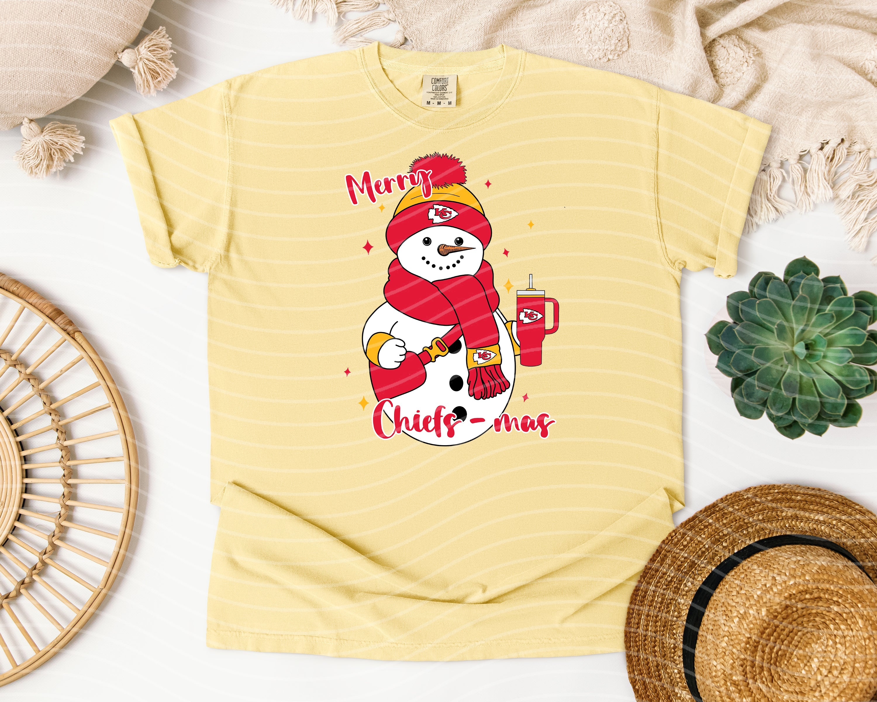 Anchored Grace Boutique Merry Chiefs-mas graphic tee featuring festive holiday design and bold lettering on a casual T-shirt.