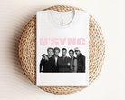 N'Sync graphic tee from Anchored Grace Boutique featuring a colorful band logo design on a casual cotton T-shirt.