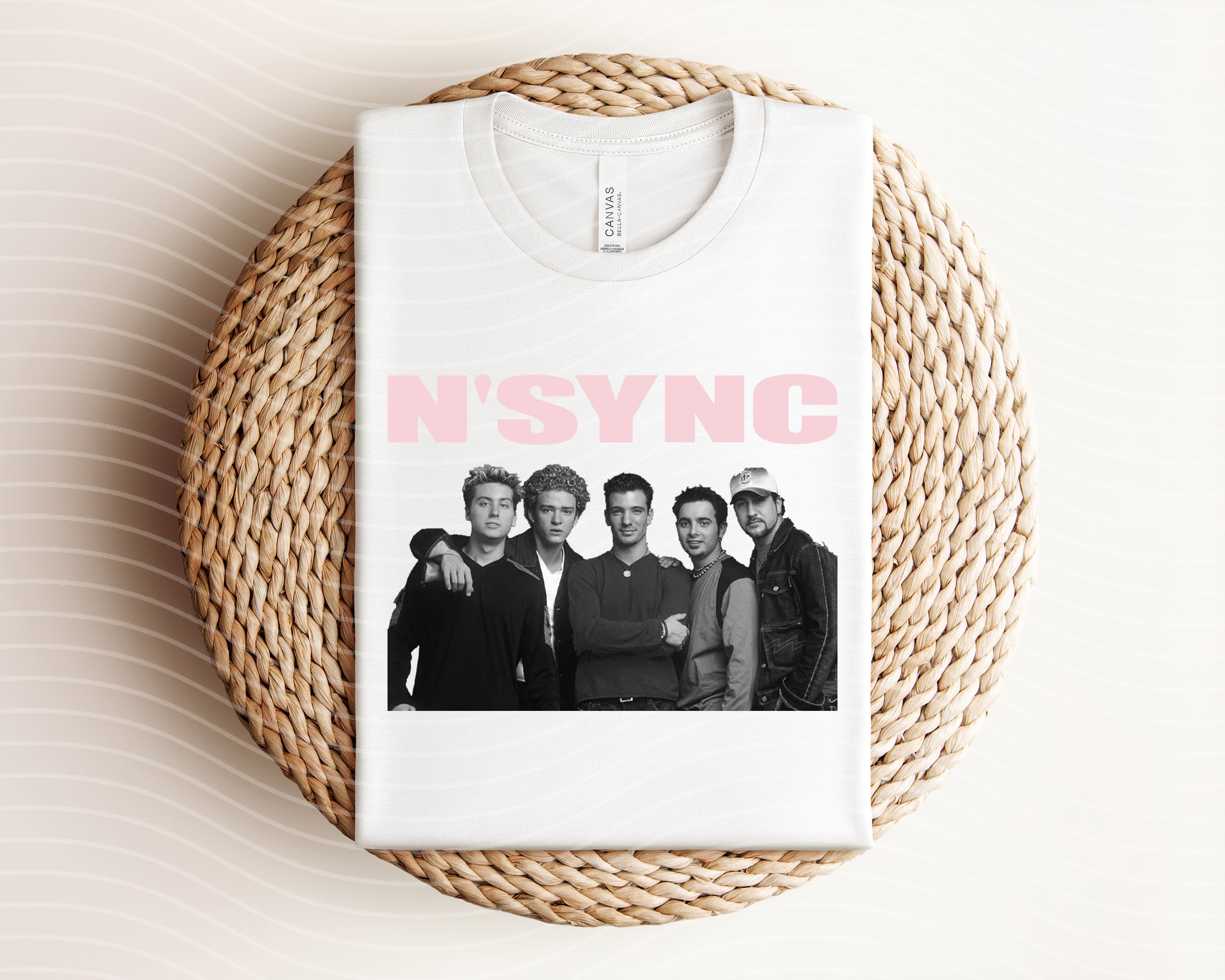 N'Sync graphic tee from Anchored Grace Boutique featuring a colorful band logo design on a casual cotton T-shirt.