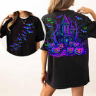 Neon Bats Haunted House graphic tee by Anchored Grace Boutique, featuring spooky bats and haunted house design on cotton t-shirt.