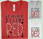 Red graphic tee from Anchored Grace Boutique with "On Fridays We Wear Red" slogan, casual style, front view.