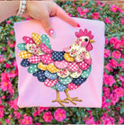 Colorful patchwork hen graphic tee by Anchored Grace Boutique, featuring vibrant fabric patches and a playful hen illustration.