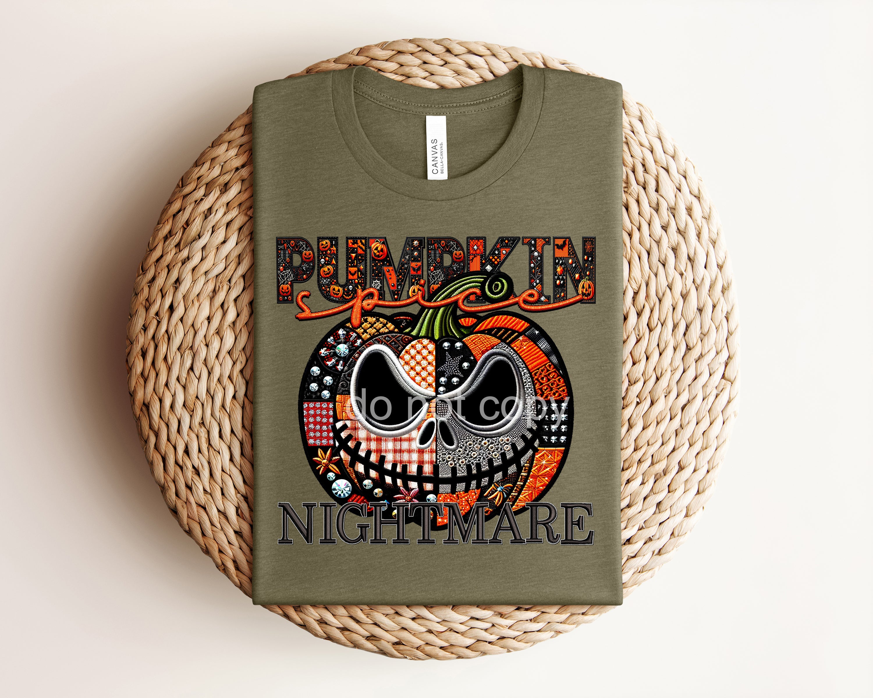 Pumpkin Spice Nightmare graphic tee by Anchored Grace Boutique featuring fall-themed spooky pumpkin design on soft fabric.