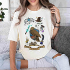 Ravenclaw collage graphic tee by Anchored Grace Boutique featuring a colorful Harry Potter-inspired design on a black T-shirt.