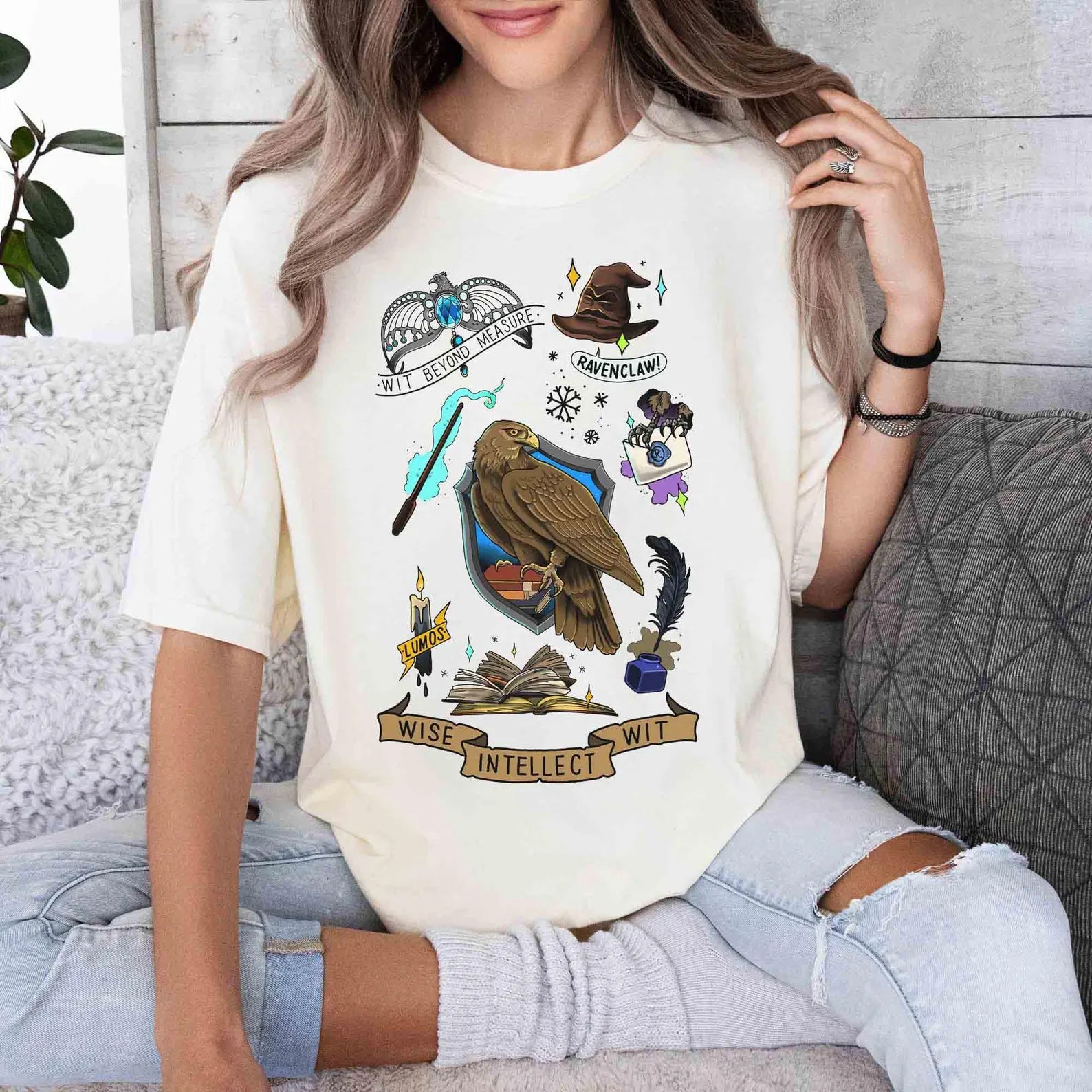 Ravenclaw collage graphic tee by Anchored Grace Boutique featuring a colorful Harry Potter-inspired design on a black T-shirt.