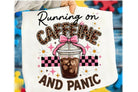 Black graphic tee from Anchored Grace Boutique featuring bold "Running on Caffeine and Panic" text and casual fit.