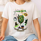Slytherin Collage Graphic Tee by Anchored Grace Boutique featuring a detailed Slytherin house design on a casual graphic t-shirt.