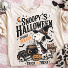 Snoopy's Halloween graphic tee by Anchored Grace Boutique featuring a festive Snoopy design on a black cotton T-shirt.