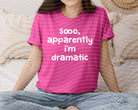 Black graphic tee from Anchored Grace Boutique featuring the phrase "Apparently I'm Dramatic" in bold white lettering.