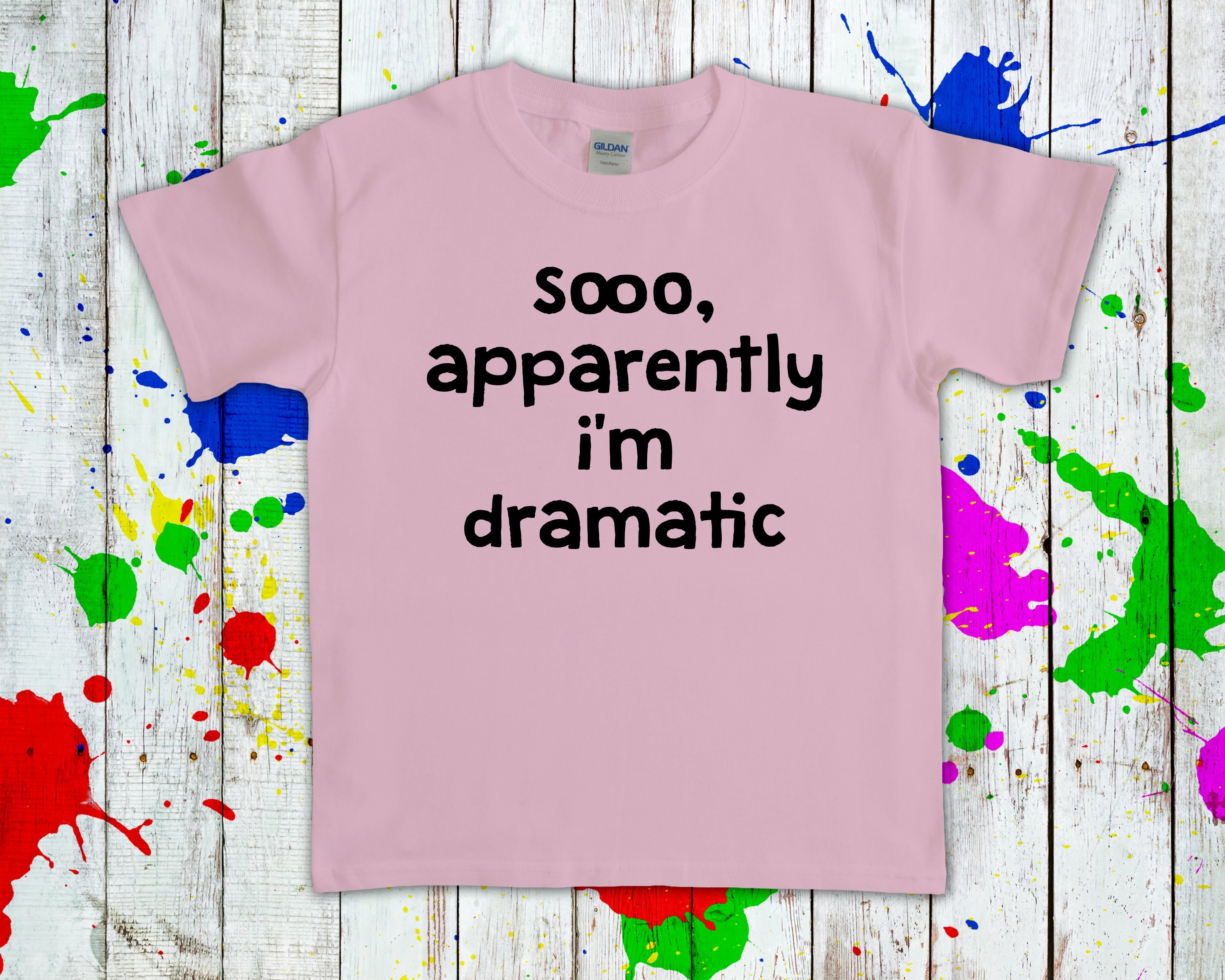 Black graphic tee from Anchored Grace Boutique featuring the phrase "Sooo Apparently I'm Dramatic" in bold lettering.