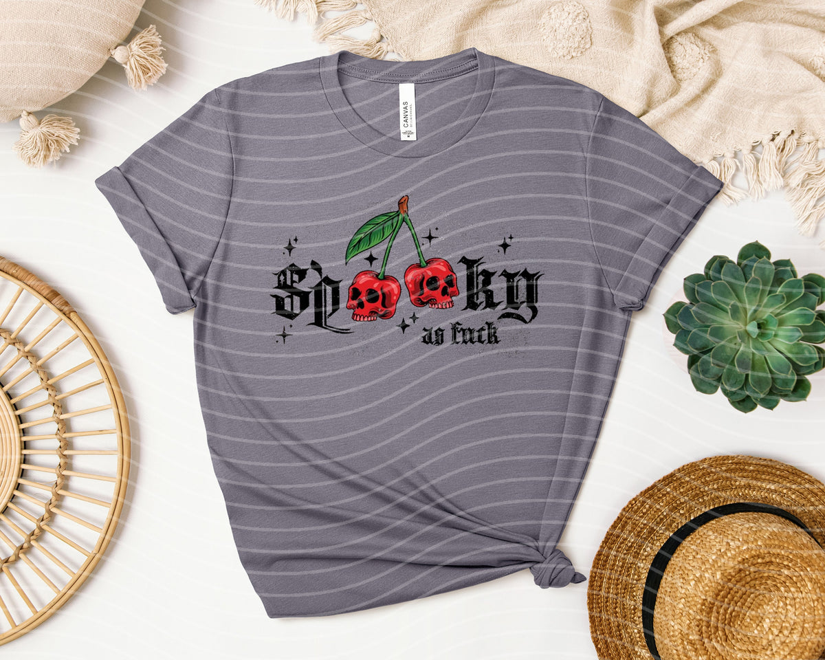 Black graphic tee from Anchored Grace Boutique featuring bold "Spooky as F***" design, casual fit, perfect for Halloween or spooky style.