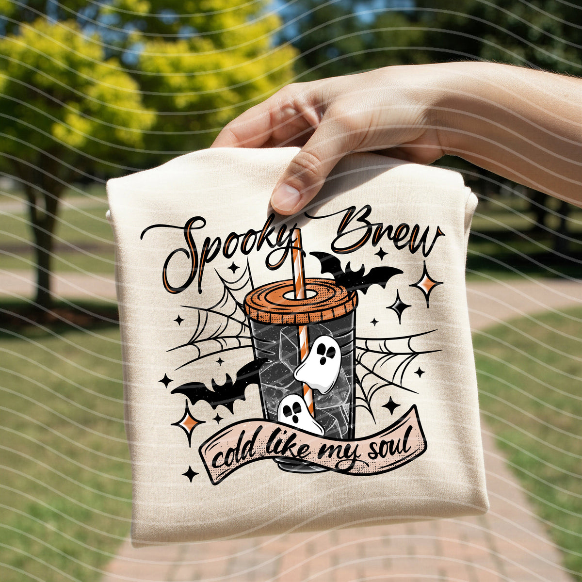 Spooky Brew graphic tee by Anchored Grace Boutique showing a Halloween-themed spooky brew design on a casual tee.
