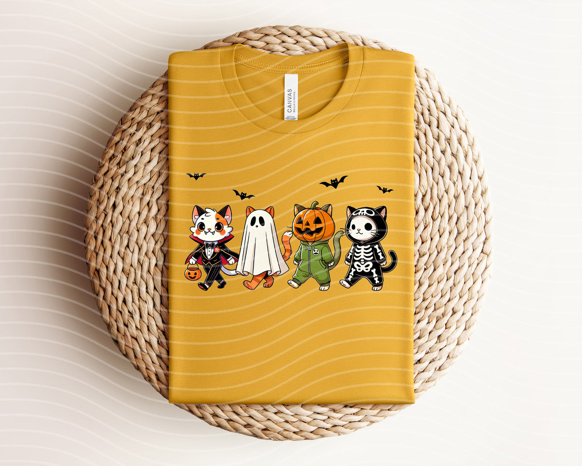 Spooky Cats graphic tee from Anchored Grace Boutique featuring a playful cat design on soft cotton fabric.