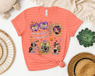Black graphic tee by Anchored Grace Boutique featuring a spooky princess design and colorful Halloween-themed artwork.