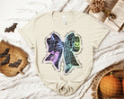 Spooky Season Bow Graphic Tee by Anchored Grace Boutique, featuring a festive Halloween-themed bow design on a casual graphic tee.