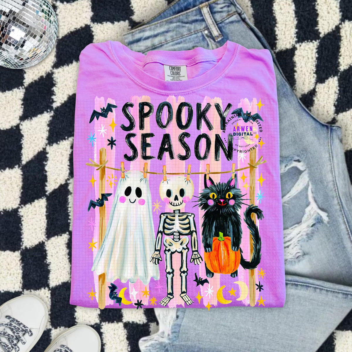 Spooky Season graphic tee by Anchored Grace Boutique featuring Halloween-themed spooky design on a casual t-shirt