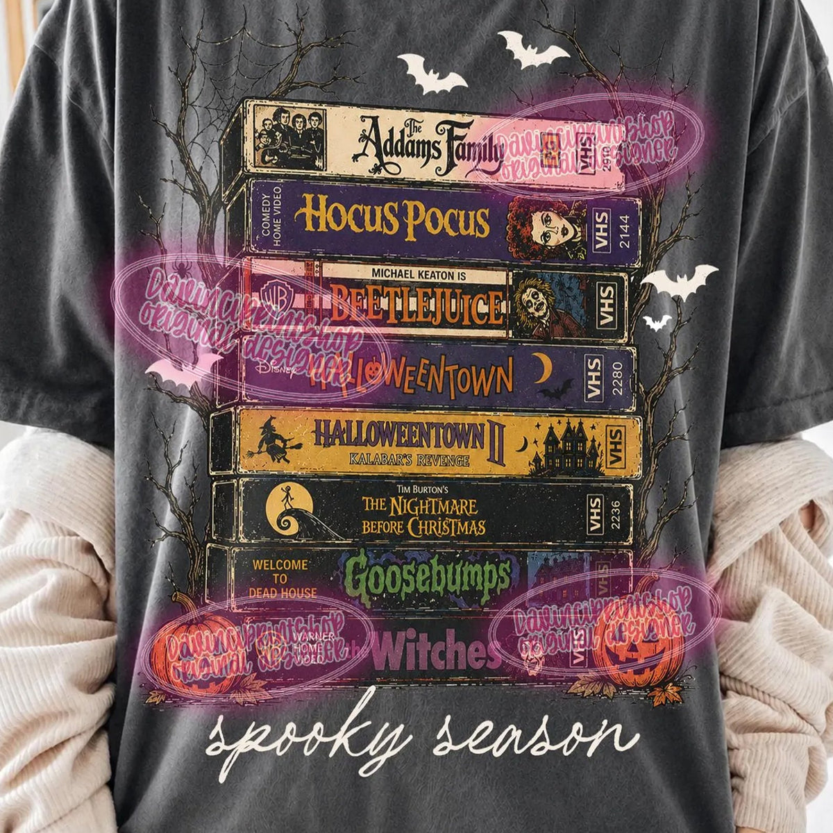 Spooky Season Movies graphic tee by Anchored Grace Boutique featuring Halloween-themed movie graphics on a casual t-shirt.