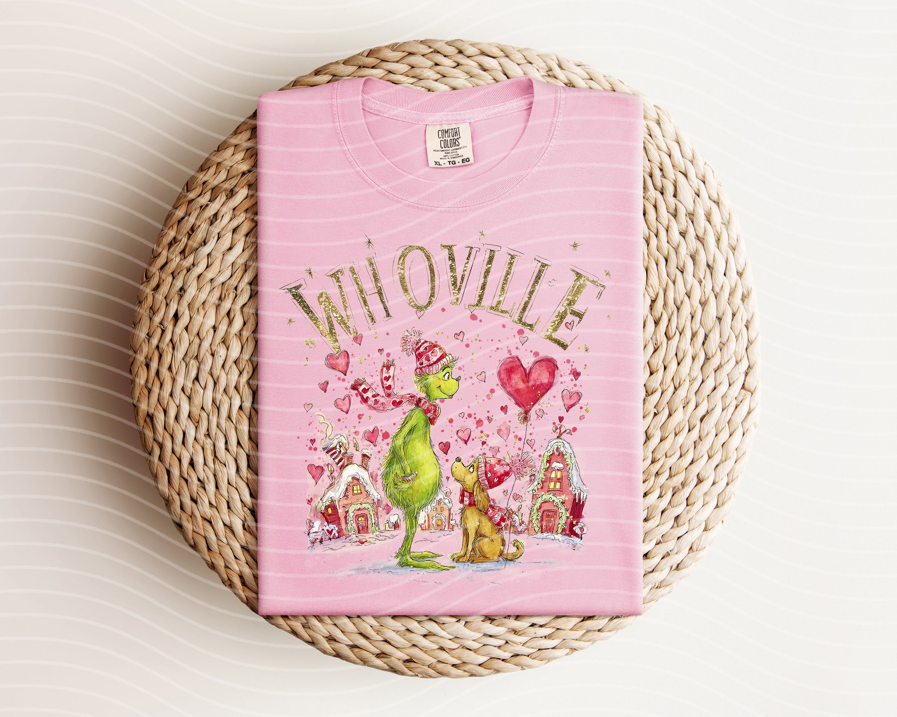 Black Whoville graphic tee by Anchored Grace Boutique featuring a festive holiday design on soft cotton fabric.