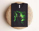 Dark graphic tee featuring a wicked witch design from Anchored Grace Boutique, casual apparel with spooky Halloween style.