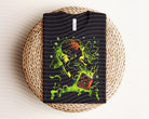 Dark graphic tee featuring Winifred design from Anchored Grace Boutique, showcasing a stylish and trendy casual shirt.