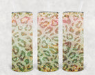 Glitter leopard 20 oz skinny tumbler by Anchored Grace Boutique with a sleek design and colorful leopard print.