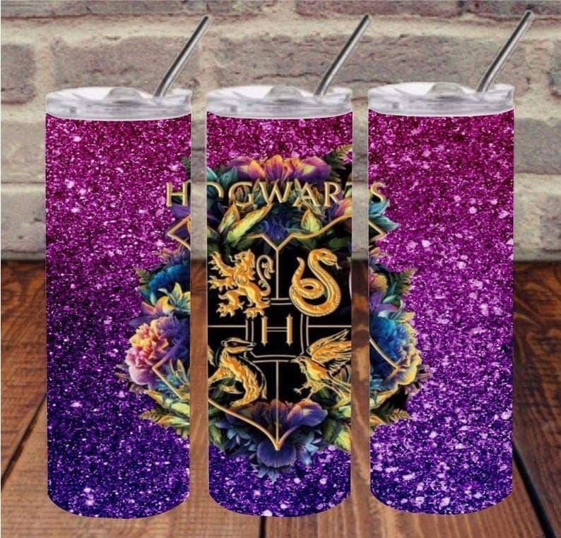Hogwarts 20 oz skinny tumbler by Anchored Grace Boutique with Hogwarts logo and a sleek, durable design for hot and cold drinks.