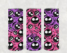 Anchored Grace Boutique Jack Faces 20 oz skinny tumbler with a colorful cartoon face design and stainless steel body.