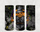 Jack O Lantern 20 oz skinny tumbler by Anchored Grace Boutique with orange pumpkin design on stainless steel container.
