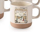 White ceramic Hogsmeade mug by Anchored Grace Boutique featuring a Harry Potter-inspired design.