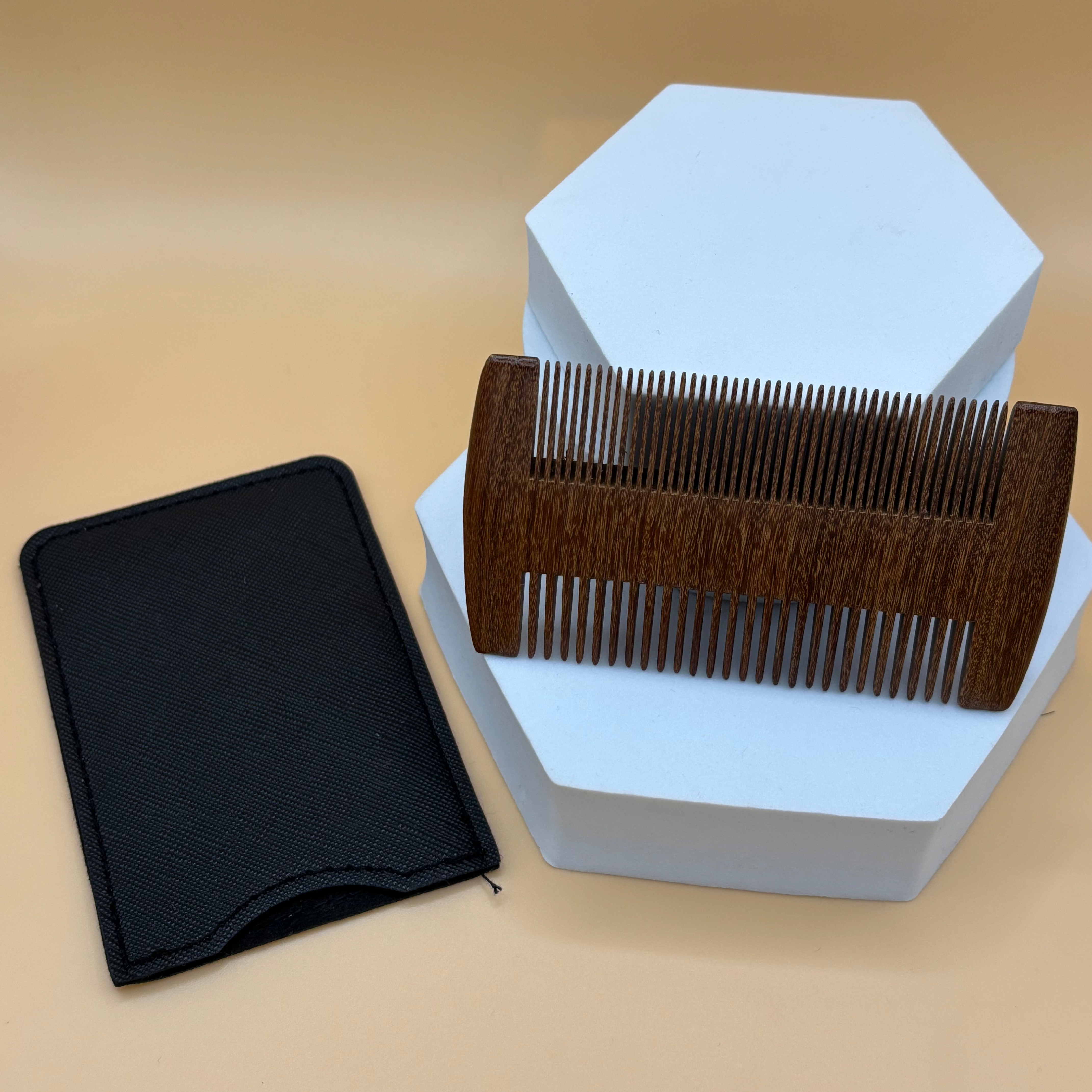 Sandalwood hair and beard comb by Ancient Health & Healings with smooth, polished teeth for gentle grooming.