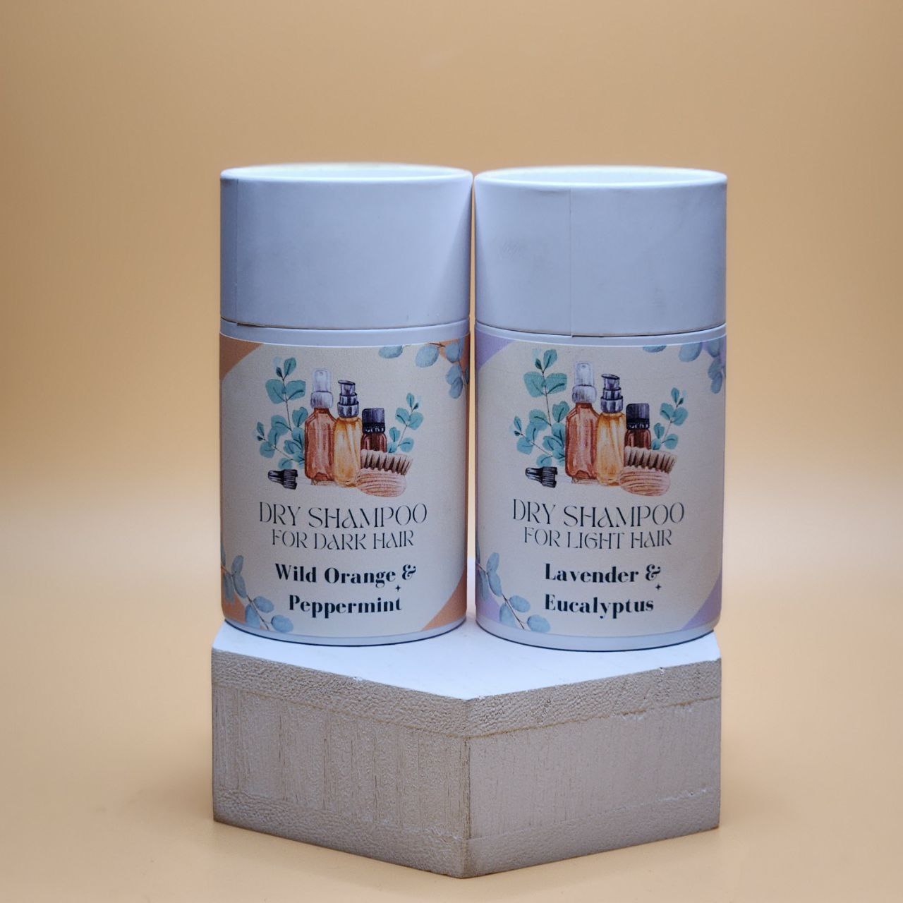 Ancient Health & Healings all-natural dry shampoo powder for light hair, in a clear container with white powder inside.