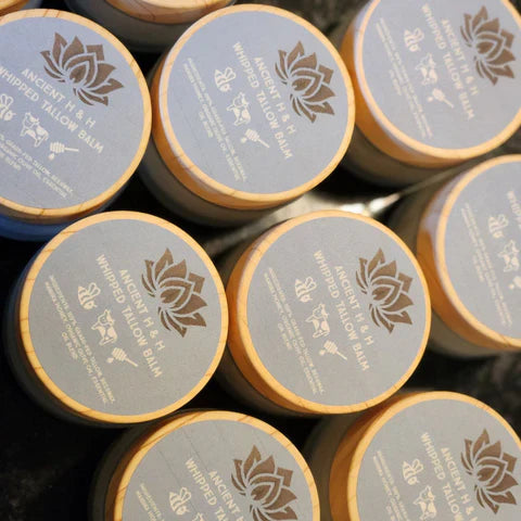 Creamy whipped tallow balm by Ancient Health & Healings for nourishing skin care in a 7oz jar.