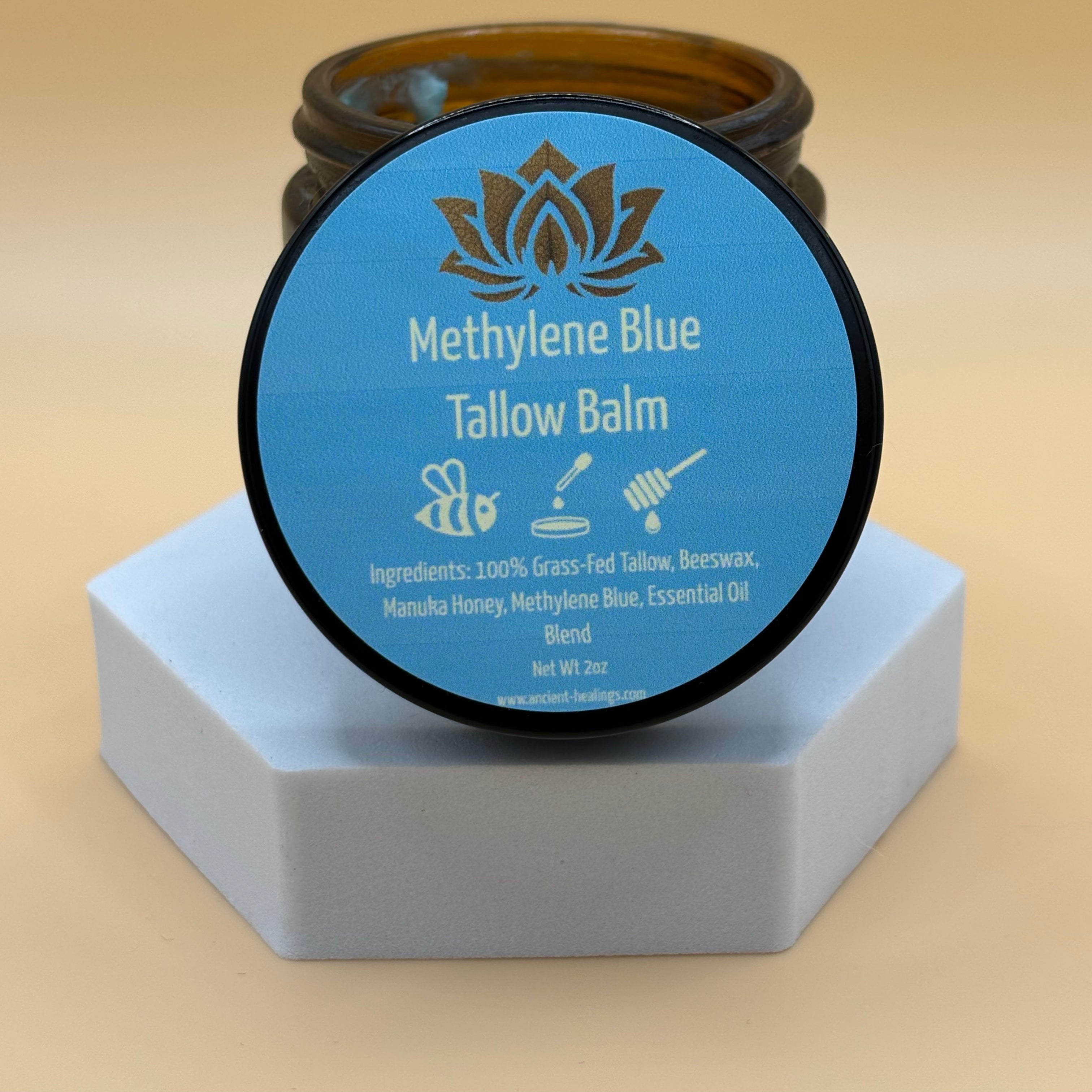 Ancient Health & Healings Methylene Blue Tallow Balm in a 2oz jar, natural skin care product for soothing and moisturizing skin.
