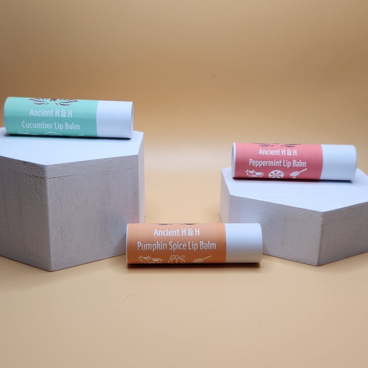 Ancient Health & Healings Halal Tallow Lip Balm 3-pack, natural skincare with soothing cucumber flavor, in a retail package.