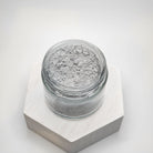 Ancient Health & Healings peppermint remineralizing tooth powder in a natural toothpaste form, showing the product packaging.