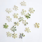 Antique Botanicals jigsaw puzzle by Anna Griffin Inc., featuring vintage botanical illustrations and detailed floral artwork.