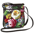 Anna Griffin Inc. Astrid crossbody bag with adjustable strap, featuring elegant design and structured shape in soft, neutral tone.