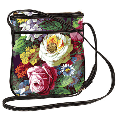Anna Griffin Inc. Astrid crossbody bag with adjustable strap, featuring elegant design and structured shape in soft, neutral tone.