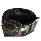 Astrid Duffle Bag by Anna Griffin Inc. in durable fabric with leather accents, featuring spacious interior and stylish design.