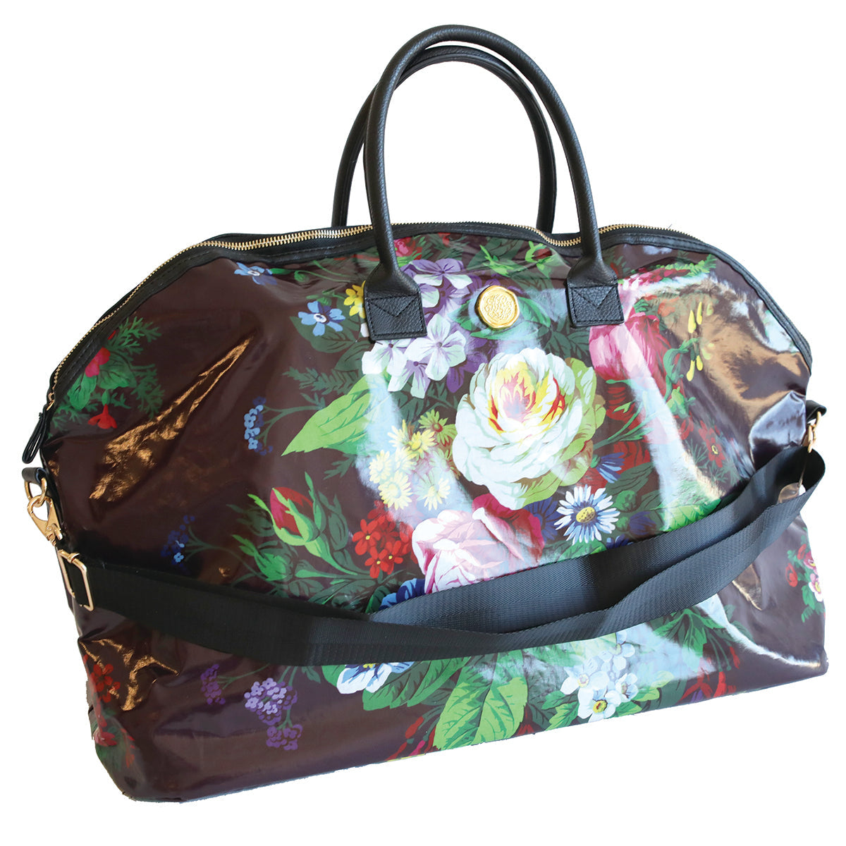 Gray Astrid duffle bag by Anna Griffin Inc. with adjustable shoulder strap, multiple compartments, and stylish woven design.